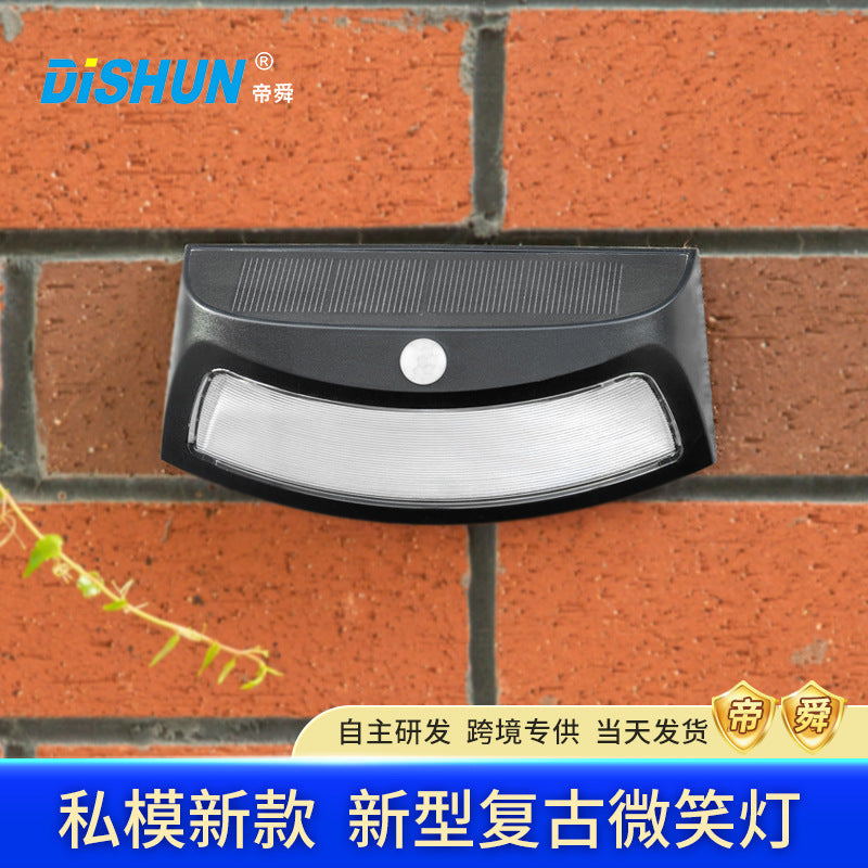 Outdoor Solar Motion Sensor Retro Smiley Wall Light (IP65)